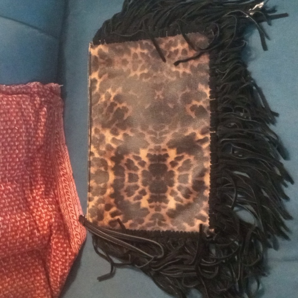 SHOE DAZZLE ANIMAL PRINT FRINGED CLUTCH